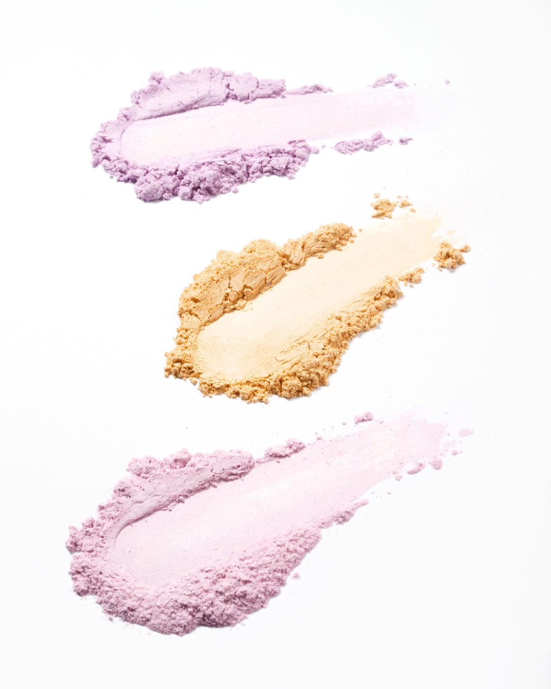 Różowy, żółty i liliowy puder wykończeniowy Annabelle Minerals – Soft Set, Smooth Skin i Light Fix